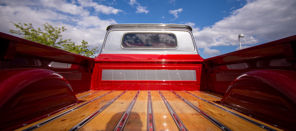 View from the back of a customized pickup truck bed